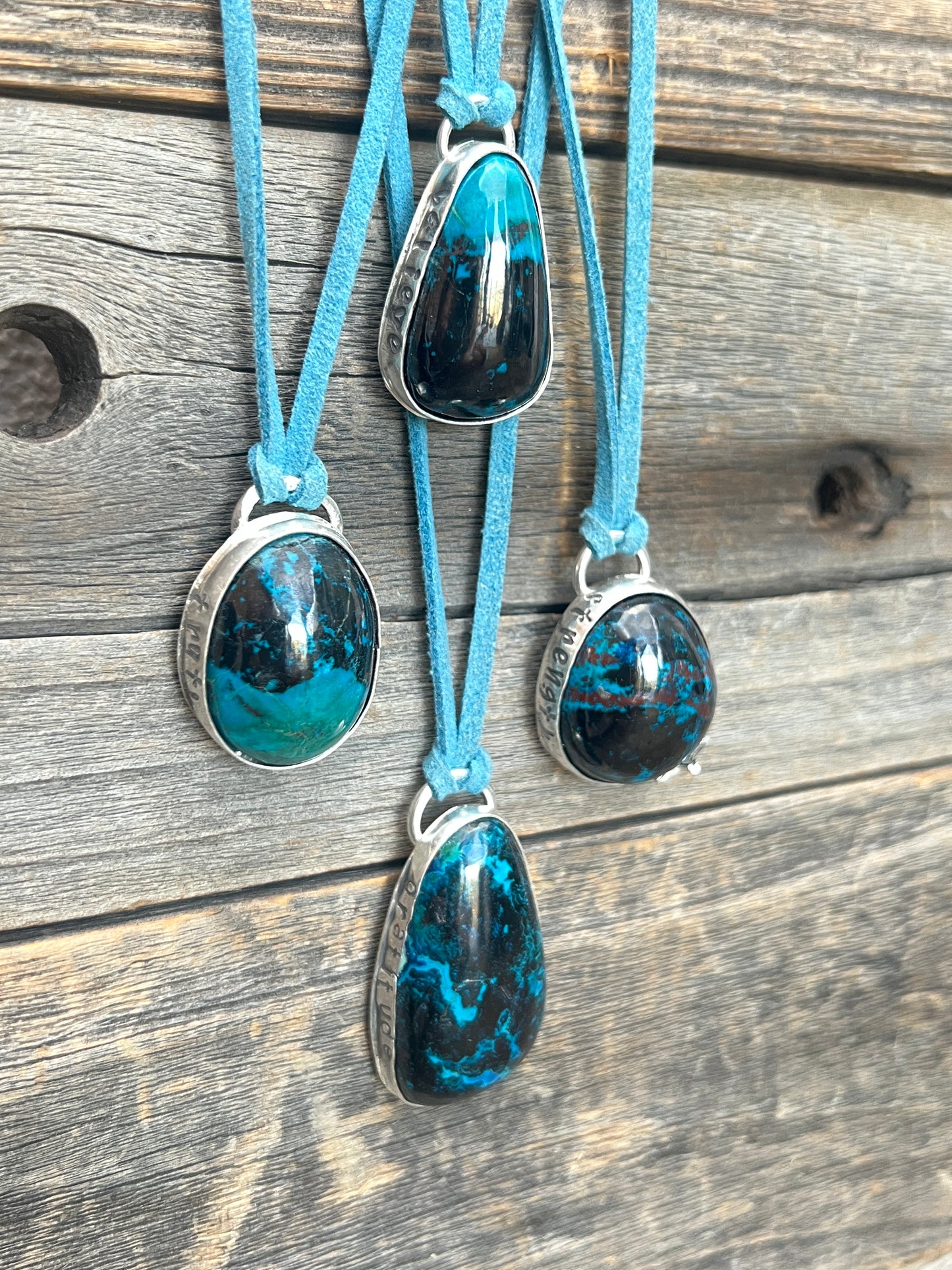 Bisbee Shattuckite sterling silver pendant on blue suede necklace