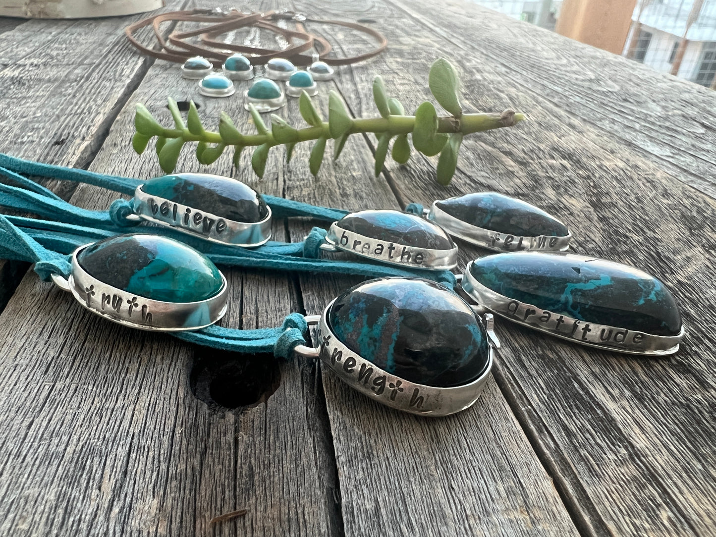 Bisbee Shattuckite sterling silver pendant on blue suede necklace