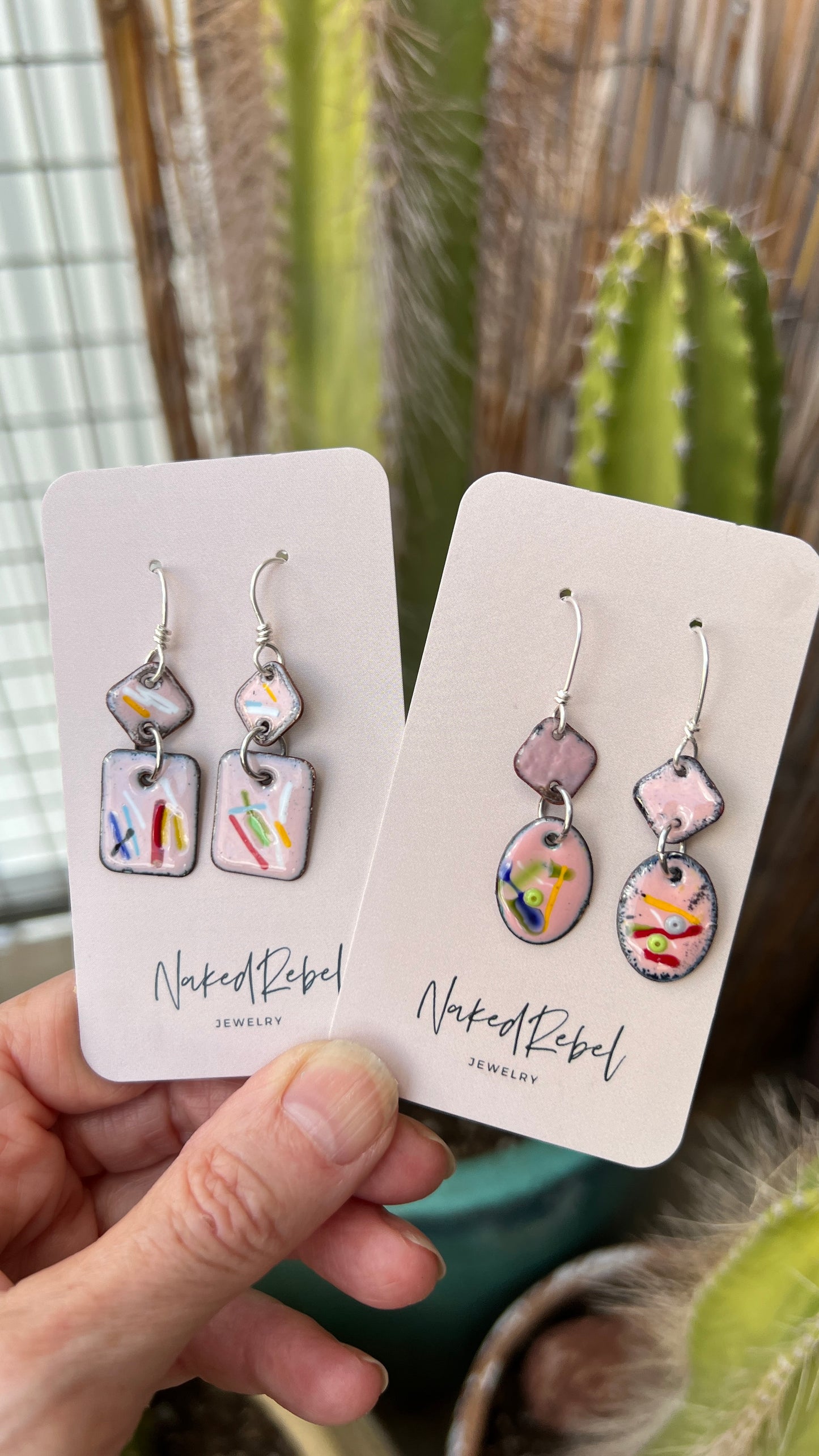 Fun pink enamel earrings, with splashes of color. Sterling Silver ear wires. Handmade.