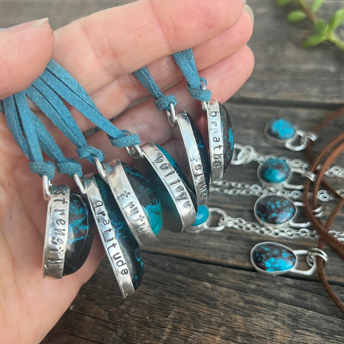 Bisbee Shattuckite sterling silver pendant on blue suede necklace