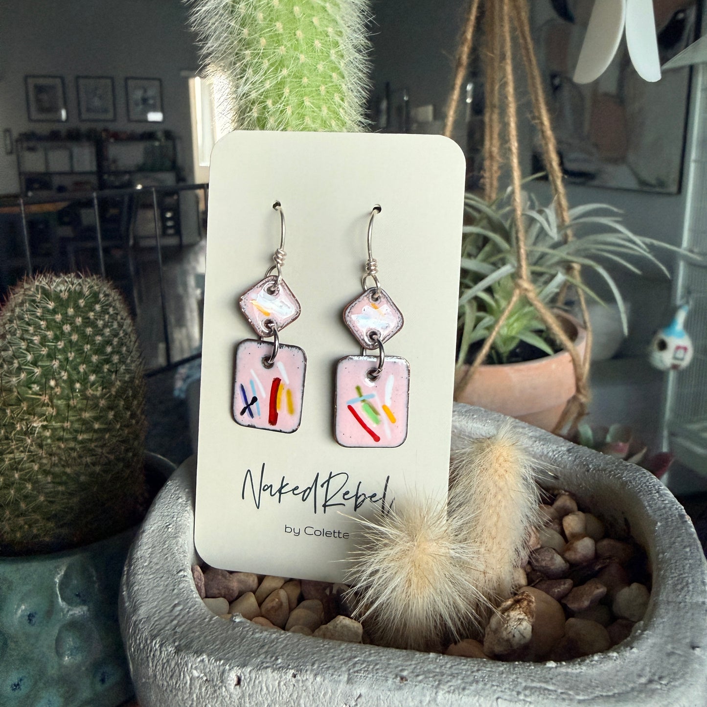 Fun pink enamel earrings, with splashes of color. Sterling Silver ear wires. Handmade.
