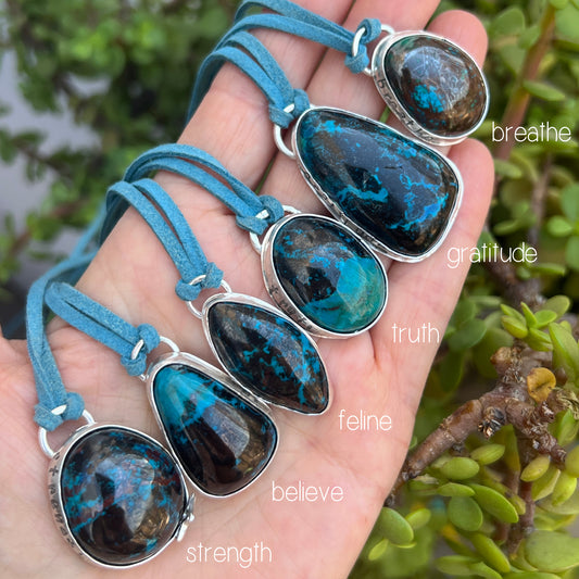 Bisbee Shattuckite sterling silver pendant on blue suede necklace